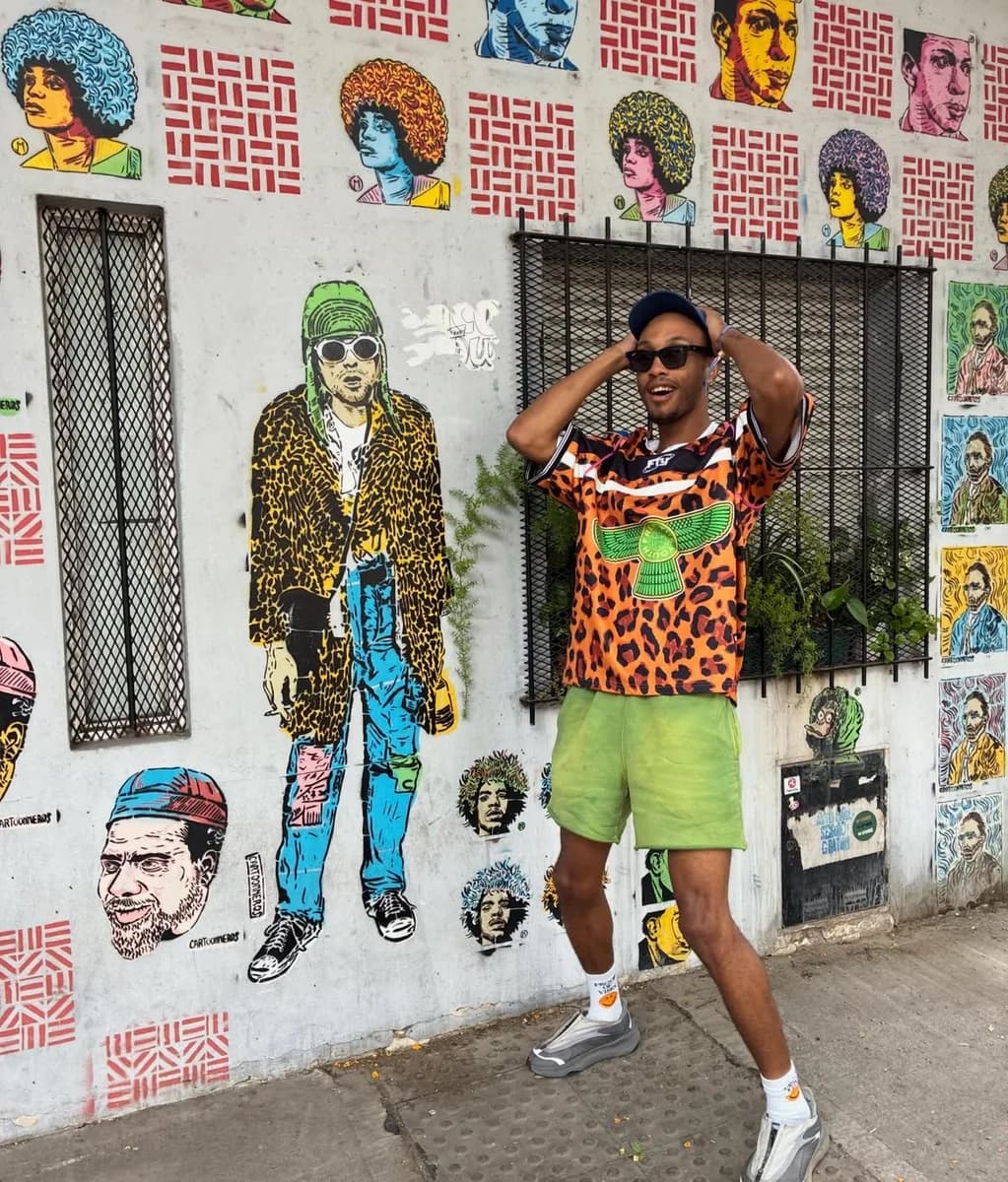 Russ Ballard against a painted mural wall in Buenos Aires
